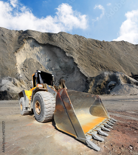 Photo: Big excavator in mine. Big excavator in mine.