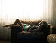 beautiful young woman lying at home