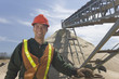 Engineer standing at a gravel and asphalt plant