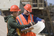 Two engineers planning at a gravel and asphalt plant
