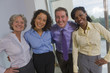 Photo: Portrait of business executives smiling together Portrait of business executives smiling together