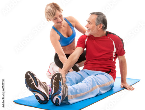Photo: Senior man doing fitness exercise Senior man doing fitness exercise