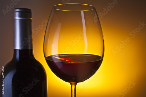 Photo: Glass and bottle of wine Glass and bottle of wine