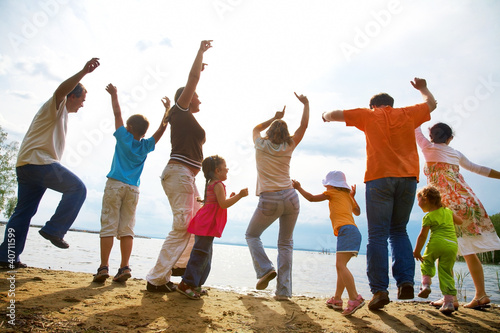 Photo: big family party on the beach big family party on the beach
