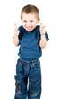 Happy boy shows the sign OK