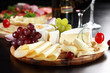 Cheese and salami platter with herbs