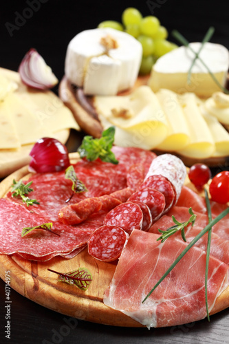 Photo: Salami and cheese platter with herbs Salami and cheese platter with herbs