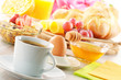 Breakfast with coffee, rolls, egg, orange juice, muesli and chee Breakfast with coffee, rolls, egg, orange juice, muesli and chee