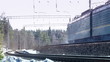 freight train in movement at winter day