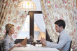 young couple having dinner at a restaurant