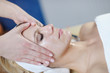 Beautiful young woman in spa
