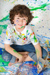 Adorable boy painting