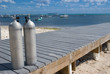 Beach scuba diving and a luxury yacht and boats