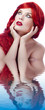 Red Hair woman. Beautiful young woman reflected in water Red Hair woman. Beautiful young woman reflected in water