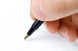 Writing. An hand who writes in a paper sheet with a pen Writing. An hand who writes in a paper sheet with a pen