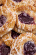 Close-up of many cherry danish pastry, breakfest sweet roll.
