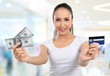 Photo: woman with money and credit card woman with money and credit card