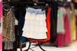 Variety of skirts and other clothes in mall