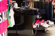 Variety of jeans and boots in mall