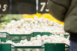 Bunch of garlic on boxes in supermarket
