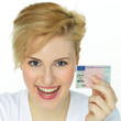 Young woman is so happy getting a driver licence