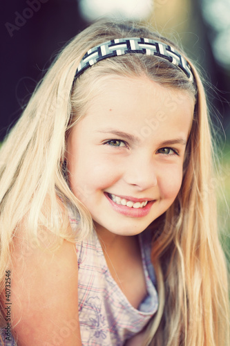 Photo: portrait of a young girl portrait of a young girl