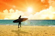 Illustration: Illustration of a surfer walking at the beach during sunset Illustration of a surfer walking at the beach during sunset