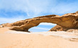 Photo: sandstone Bridge rock in Wadi Rum dessert sandstone Bridge rock in Wadi Rum dessert