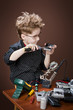 The child repairs digital cameras