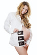 The Pregnant woman holding ultrasound image The Pregnant woman holding ultrasound image