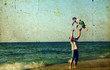 Happy father and son on the beach