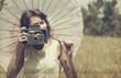 Beautiful photographer. Photo in old image style.