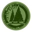 Green grunge camping stamp with firs.