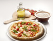 still life with pizza and ingredients