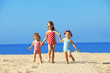 Photo: Kids playing at the beach Kids playing at the beach