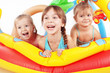 Children playing in swimming pool