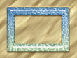 Glass Water Frame on Sand