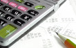 Business concept-calculator,pencil and bills