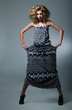 Foto: Theatre - performance. Artistic lady in creative trendy dress Theatre - performance. Artistic lady in creative trendy dress