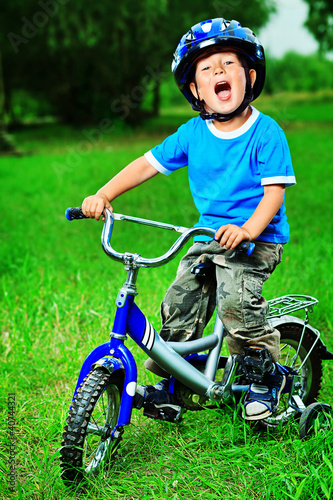 Photo: kid on bicycle kid on bicycle