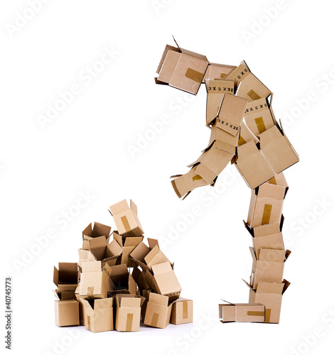 Photo: Box man looking at box pile Box man looking at box pile