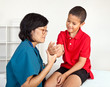 Young Boy with Hurt Wrist and Arm at Doctor's Office