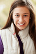 Photo: Outdoor Portrait Of Teenage Girl Wearing Winter Clothes Outdoor Portrait Of Teenage Girl Wearing Winter Clothes