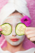 Young girl getting facial treattment at a spa