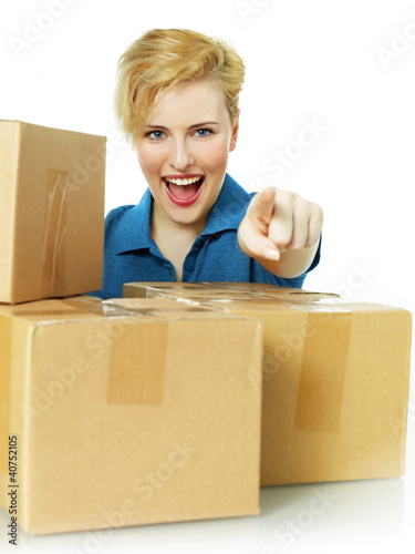 Foto: Pretty woman at work points her finger at you Pretty woman at work points her finger at you