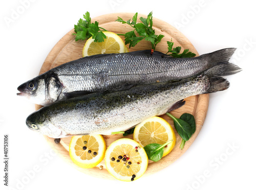Photo: Fresh fishes with lemon, parsley and spice Fresh fishes with lemon, parsley and spice