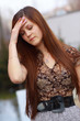 Young woman with headache