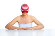 beautiful smiling woman with a sock on her head