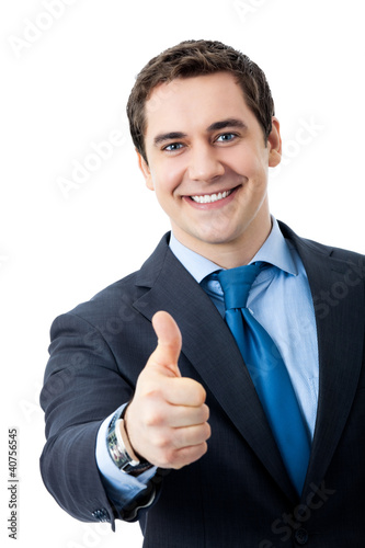 Photo: Businessman with thumbs up gesture, isolated Businessman with thumbs up gesture, isolated