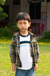 Asian little boy playing and calling Smart-phone